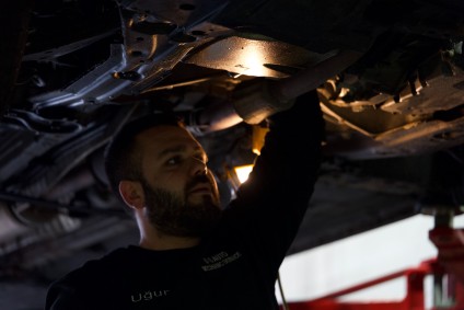 Professional mechanic using Falkron products