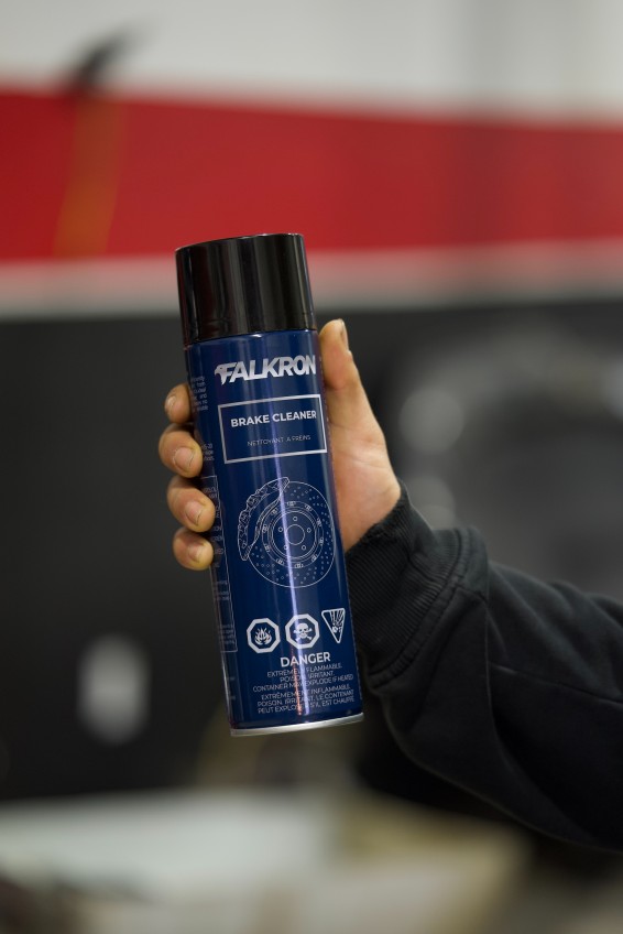 Man holding Falkron Brake Cleaner